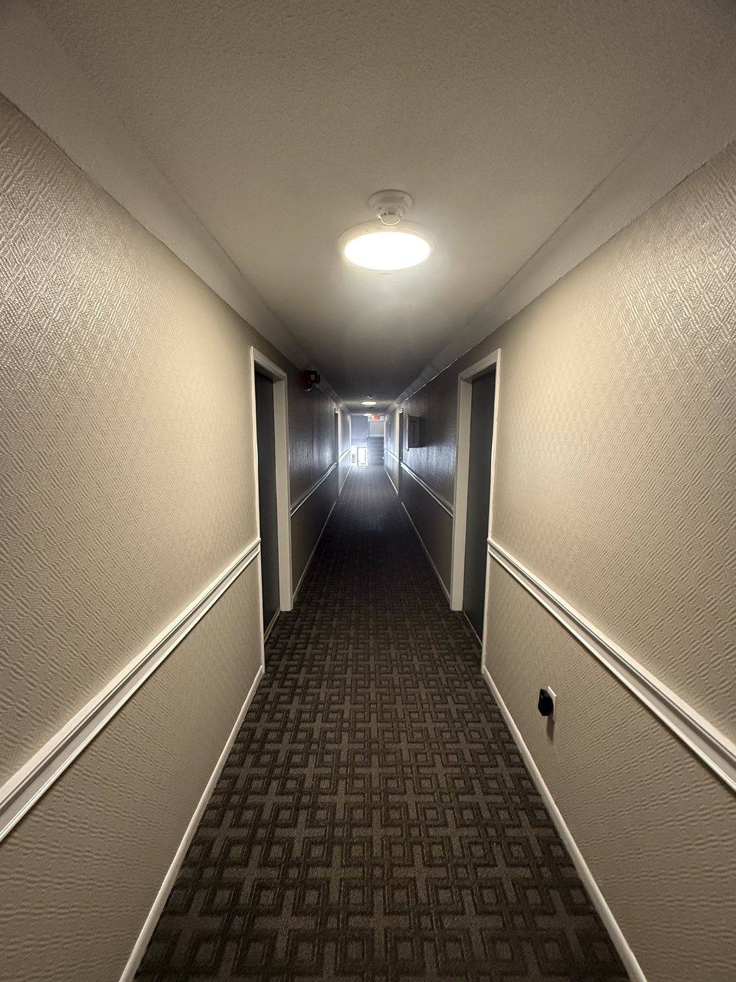 Apartment building corridor — after
