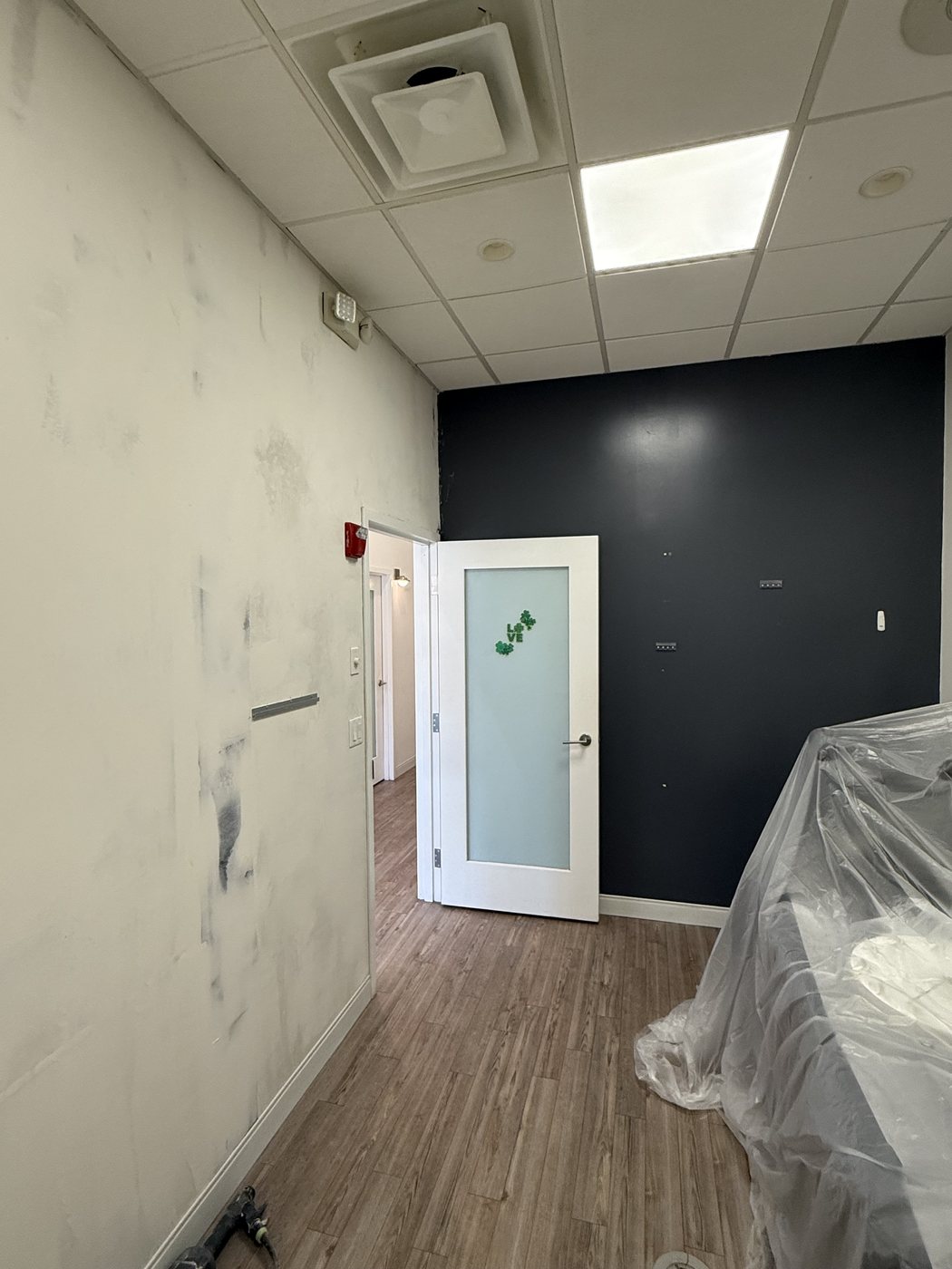 Commercial interior, accent wall — before