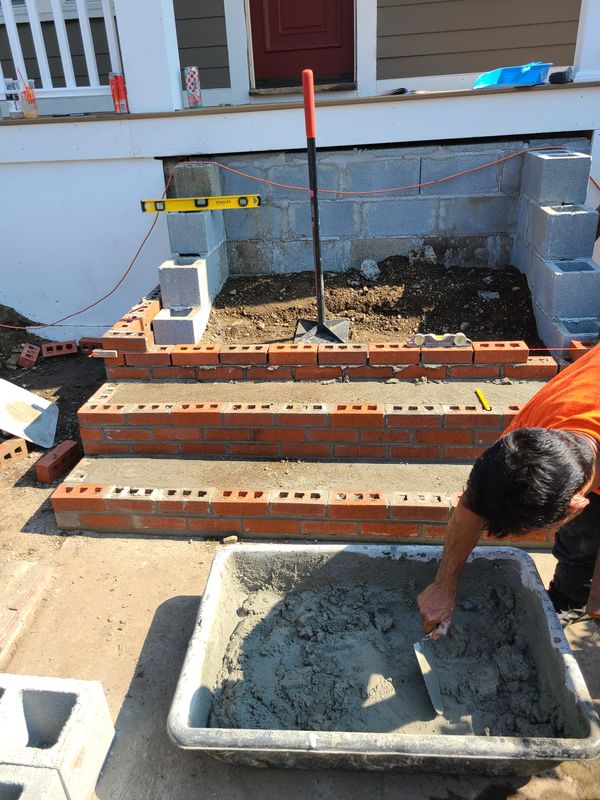 Brick steps and landing under construction