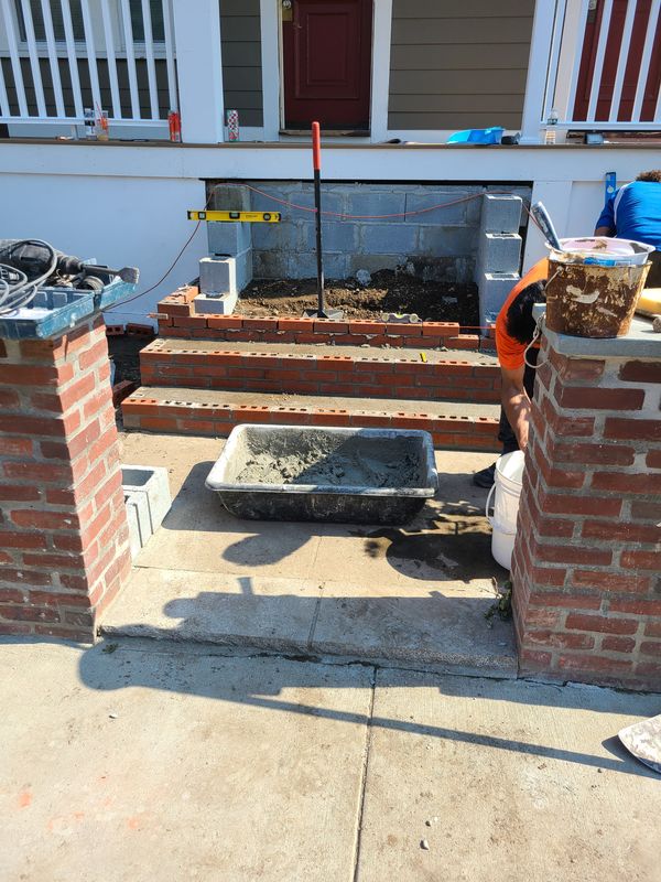 Brick step and landing construction