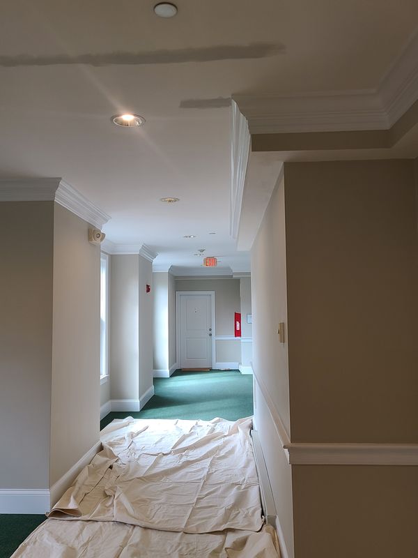 Interior hallway with crown moulding after finishing