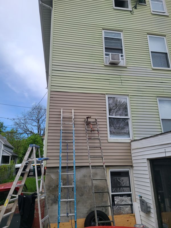 Pump staging erected on a three-decker for exterior repainting