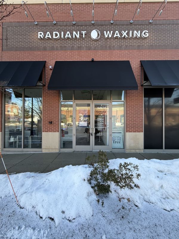 Retail storefront exterior after painting