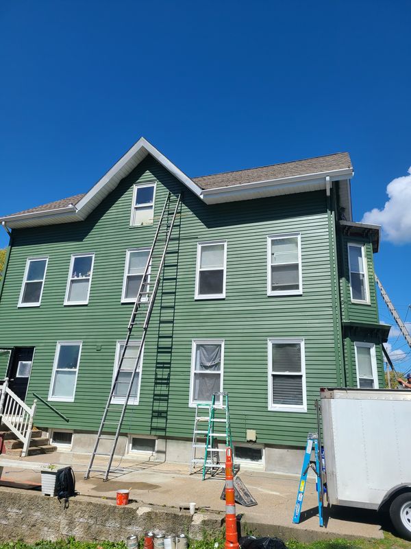 Crew and staging on a three-family exterior repaint